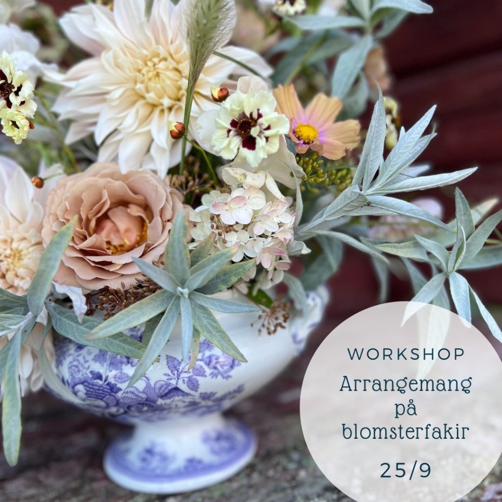 Blomsterarrangemang i antik skål
